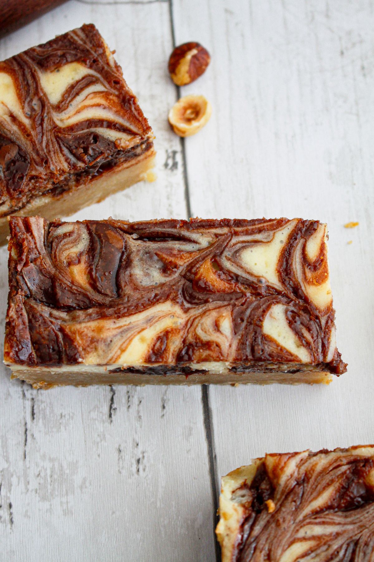 three nutella bars on a wooden background.