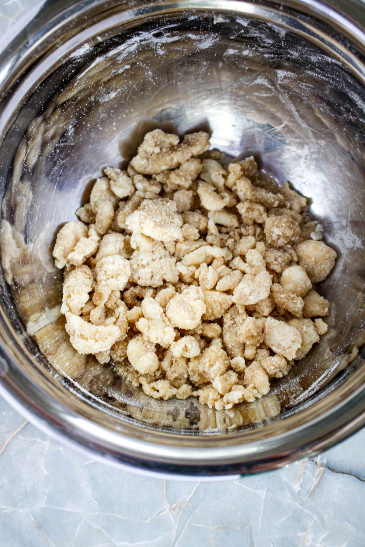 crumble being made in a large bowl.