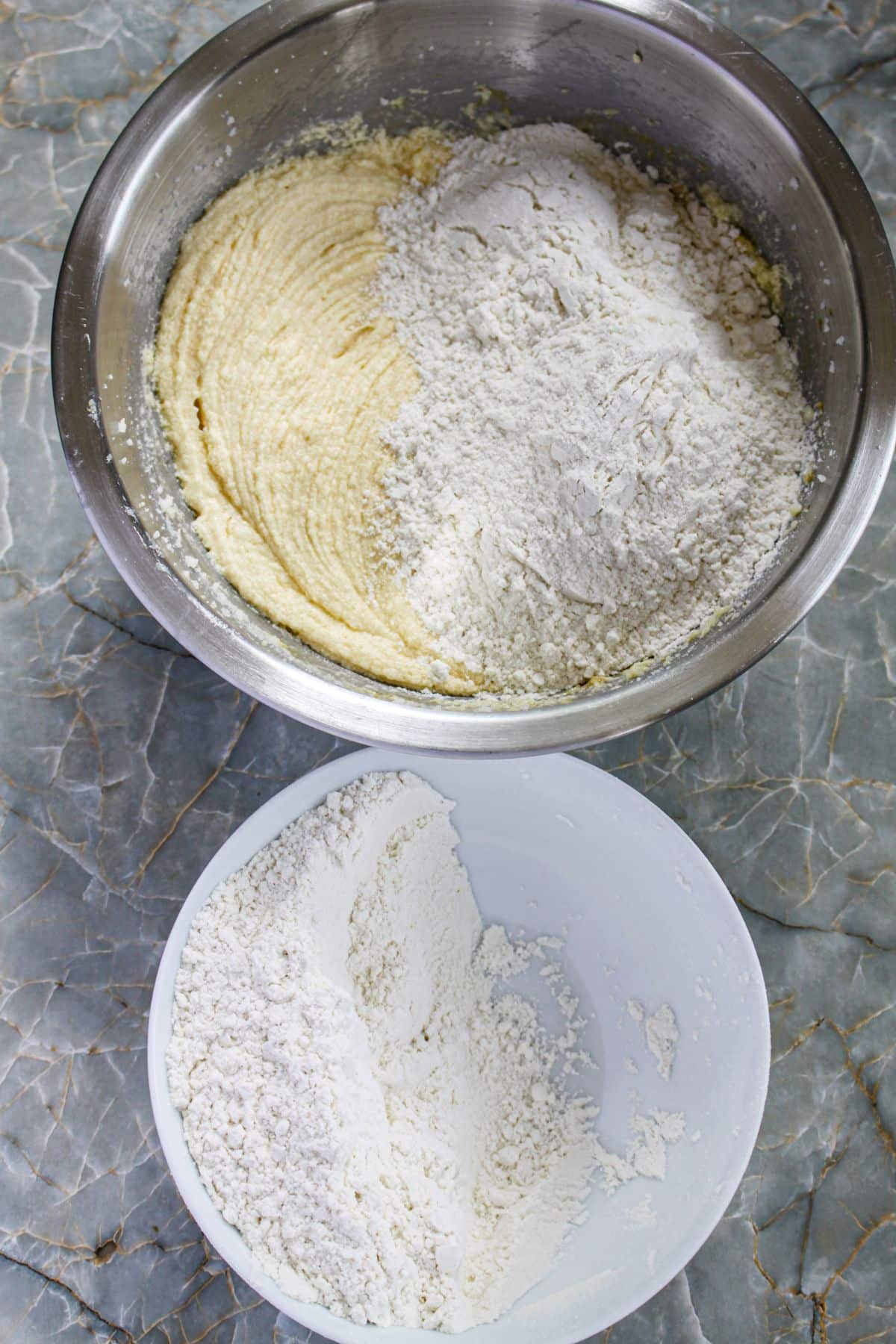 batter being mixed in a large bowl.