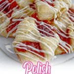 polish cookies being stacked on a plate.