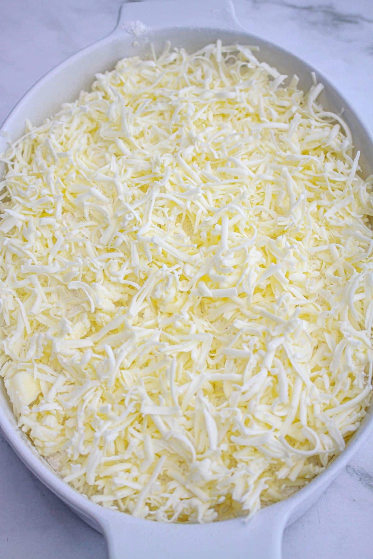 strawberry dump cheesecake ready for the oven.