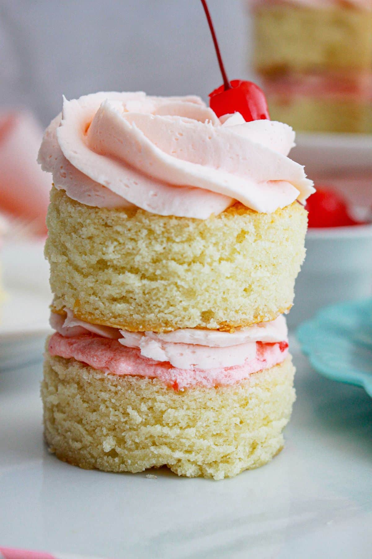 mini cherry almond cake on a counter.