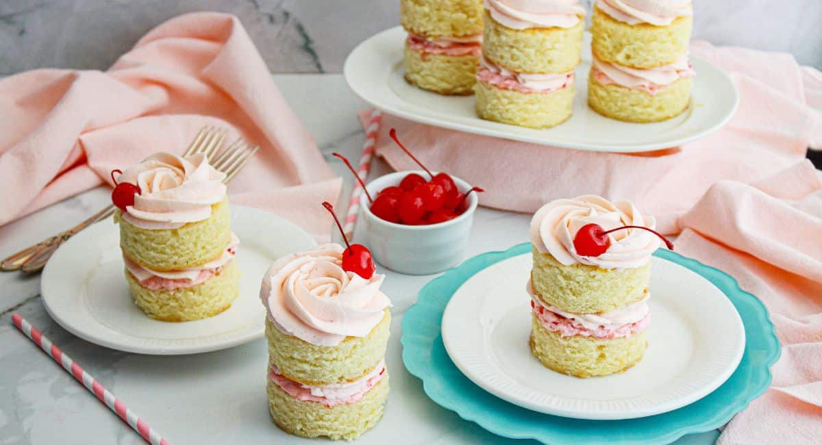 mini cherry almond cakes on a counter.