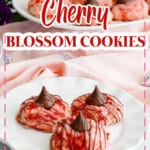 three cherry blossom cookies on a plate.