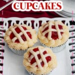 three cherry pie cupcakes on a white plate.