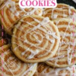cinnamon bun cookies stacked on a plate