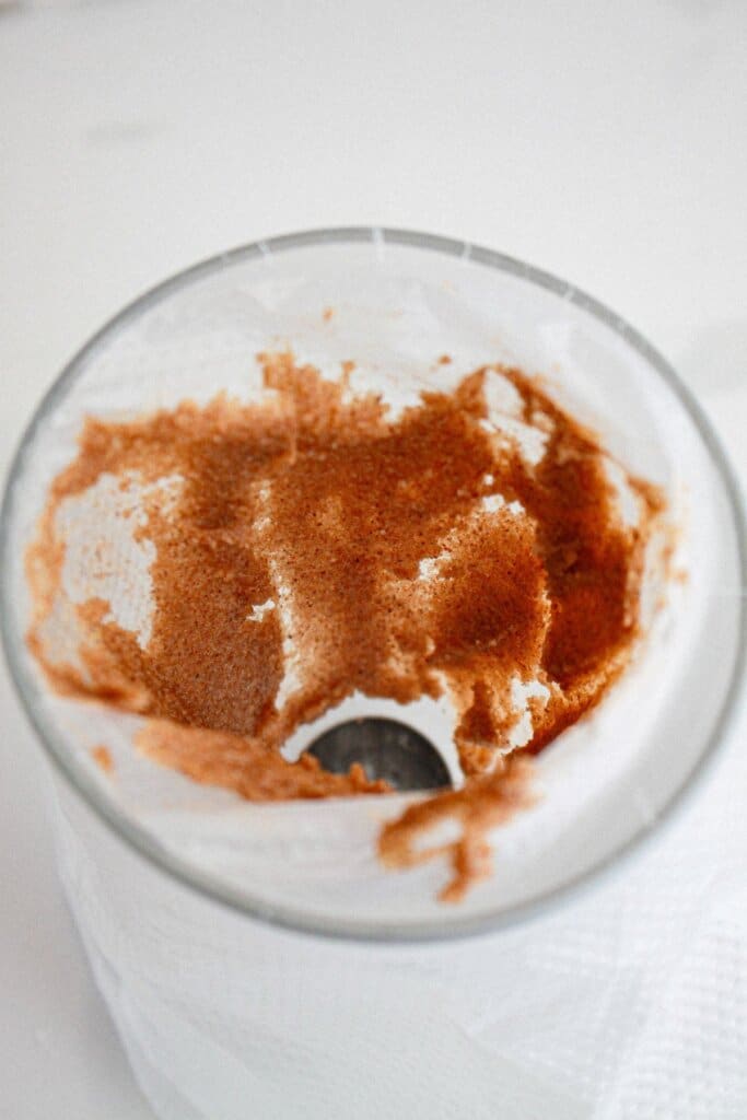 cinnamon swirl being added to a piping bag.