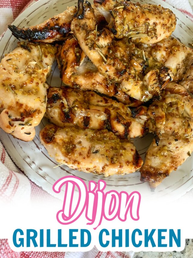 grilled dijon chicken on a large plate.
