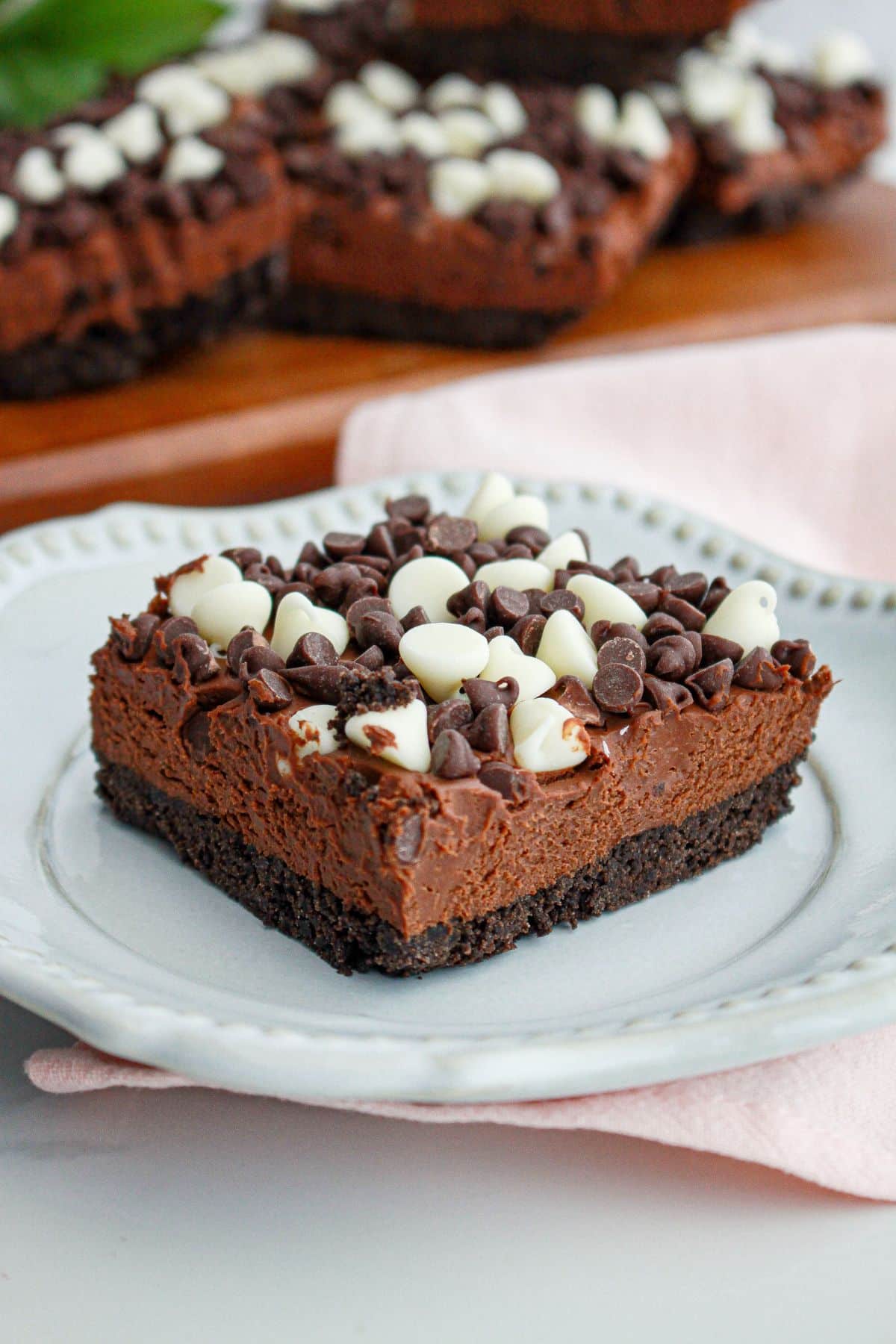 slice of death by chocolate cheesecake on a small plate.
