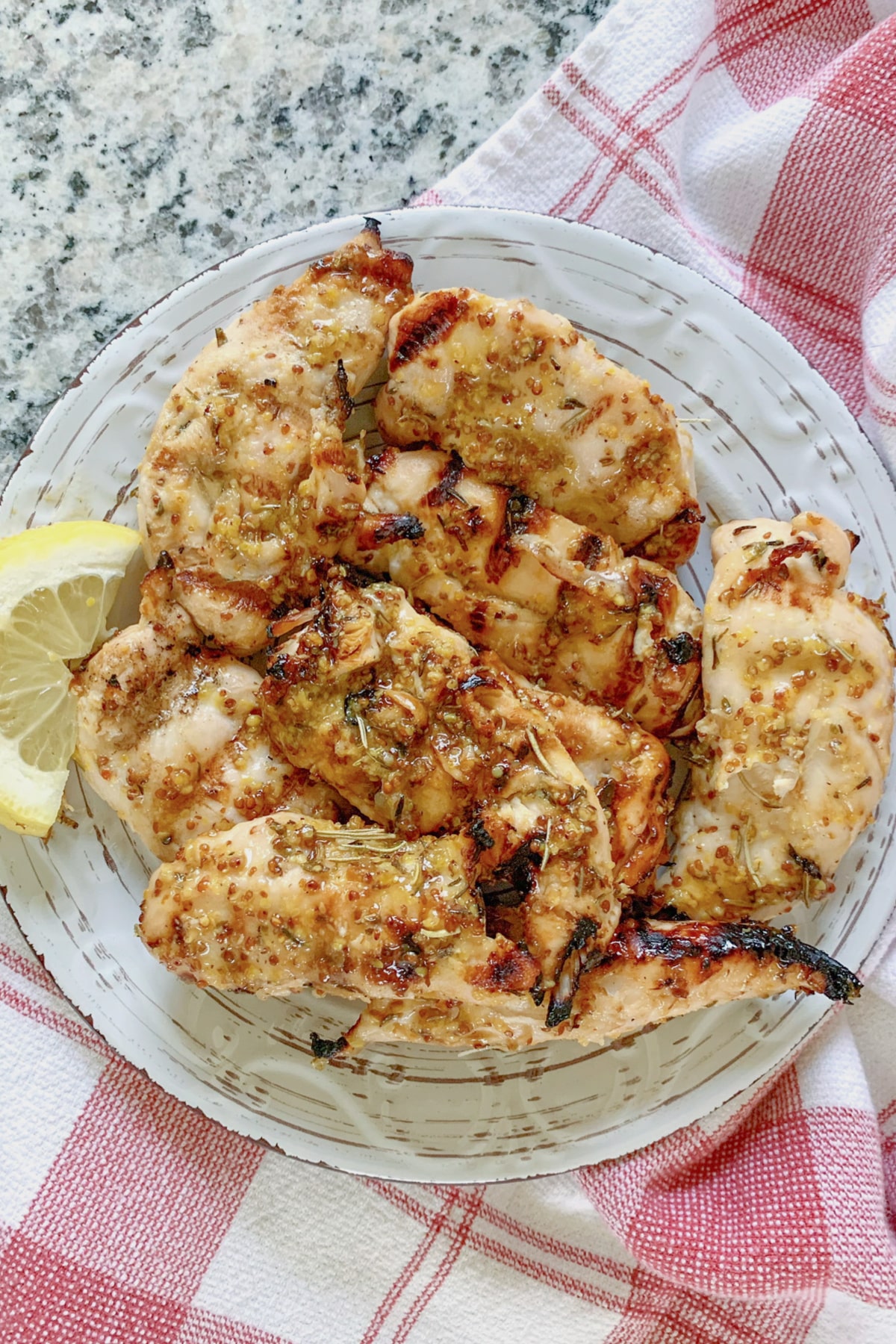 grilled dijon chicken on a large plate.