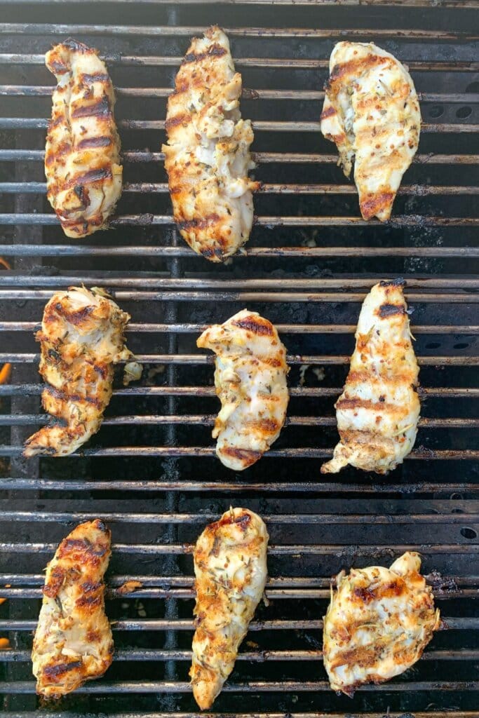 chicken tenderloins being grilled.