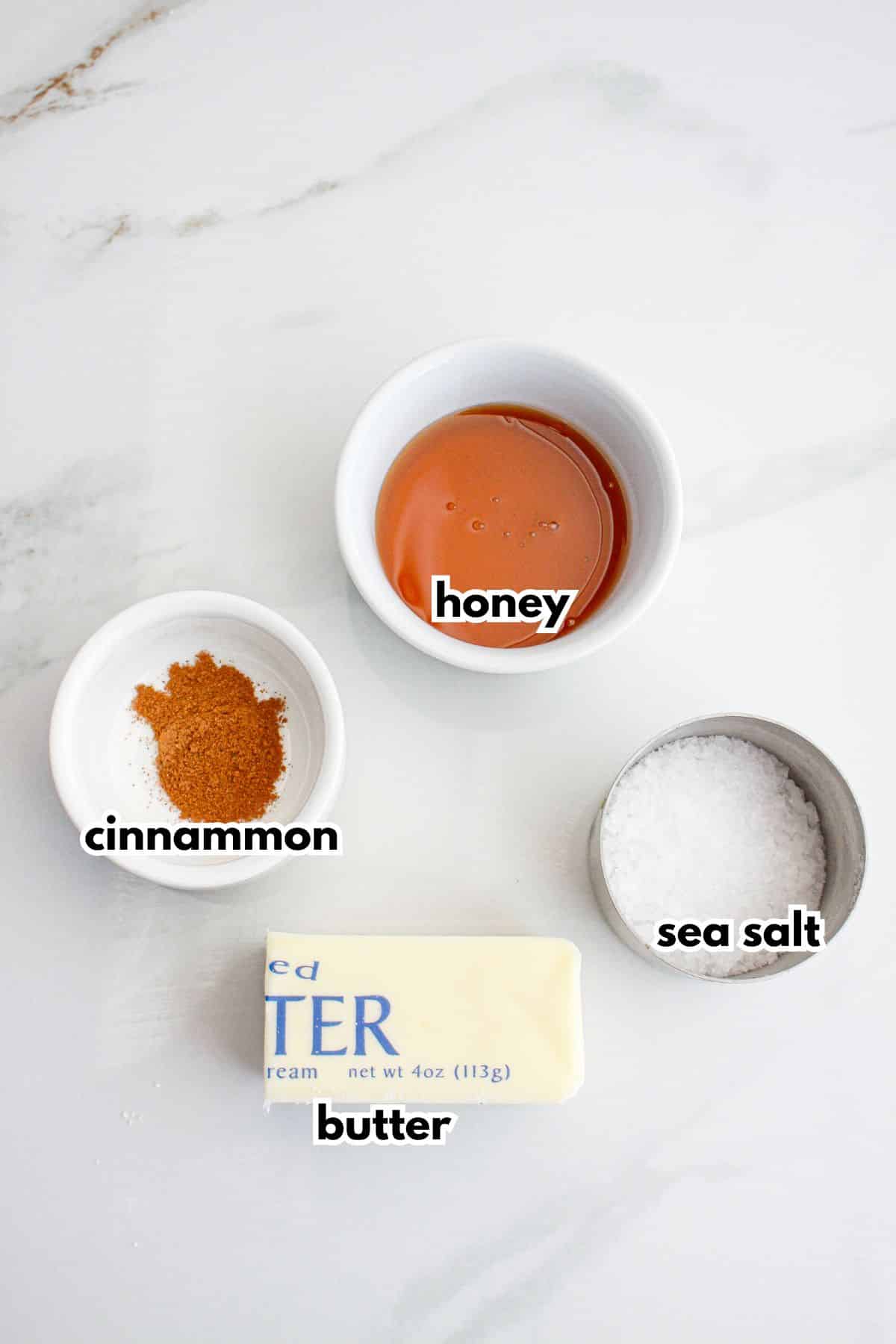 bowls of honey, cinnamon, sea salt, and butter.