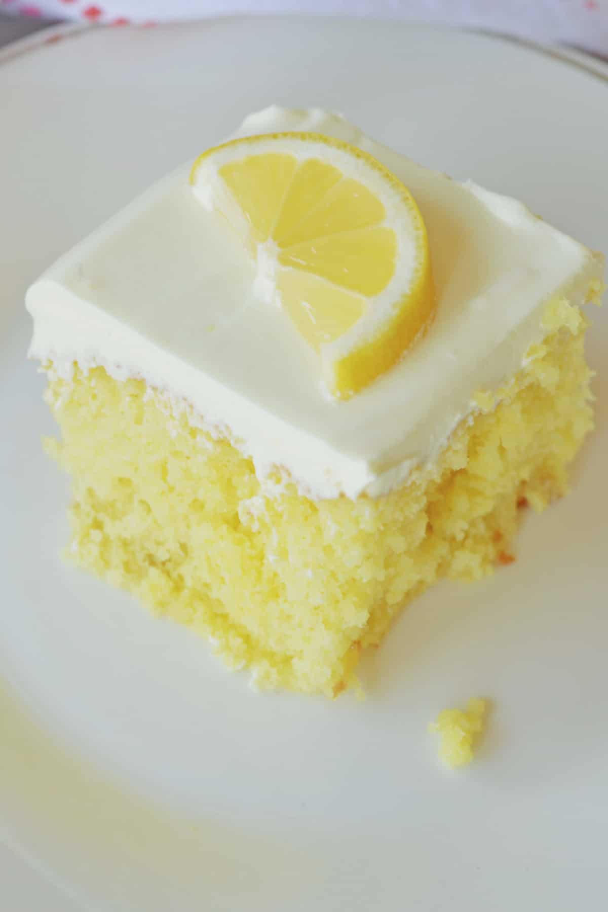 slice of lemon cake on a plate.