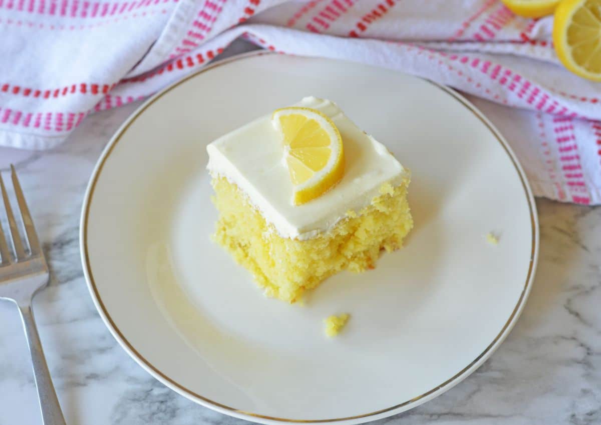 slice of lemon cake on a plate.