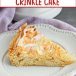 slice of lemon crinkle cake on a small plate.