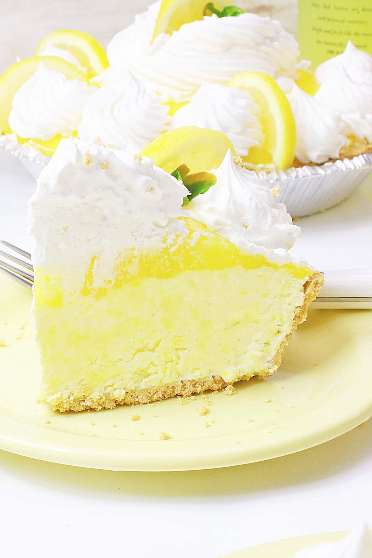 slice of limoncello pie on a plate.