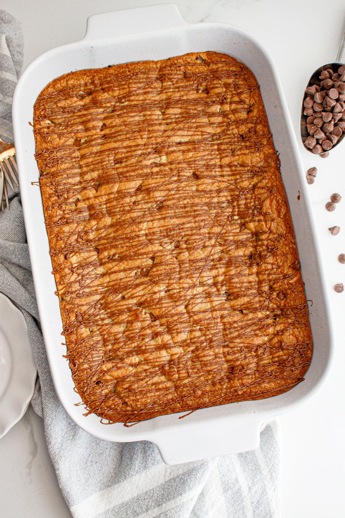 uncut peanut butter cup cookies bars on a baking dish.