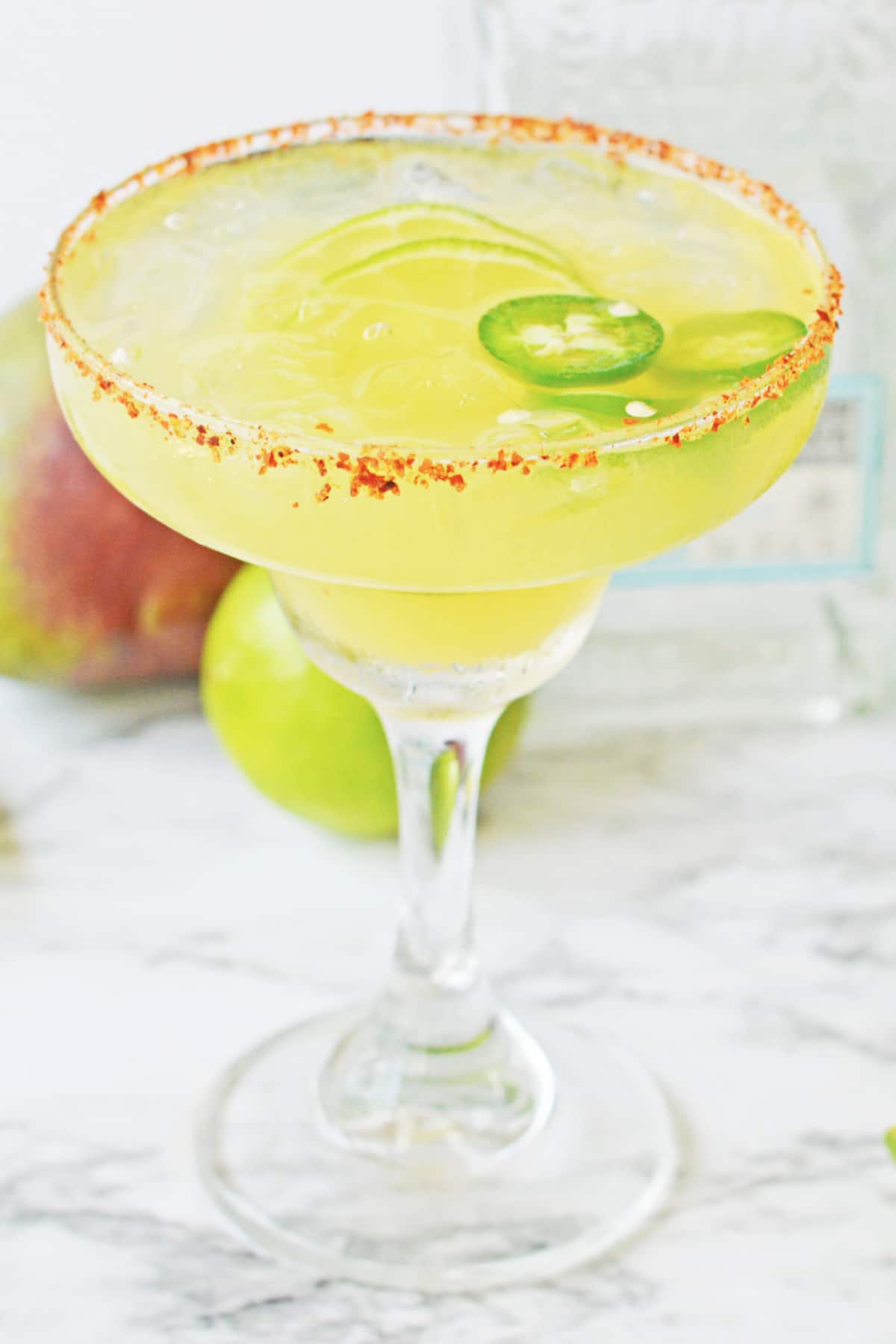 spicy mango margarita on a counter.