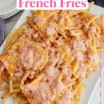 animal style french fries on a white platter.