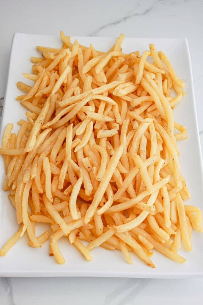 french fries on a large serving platter.