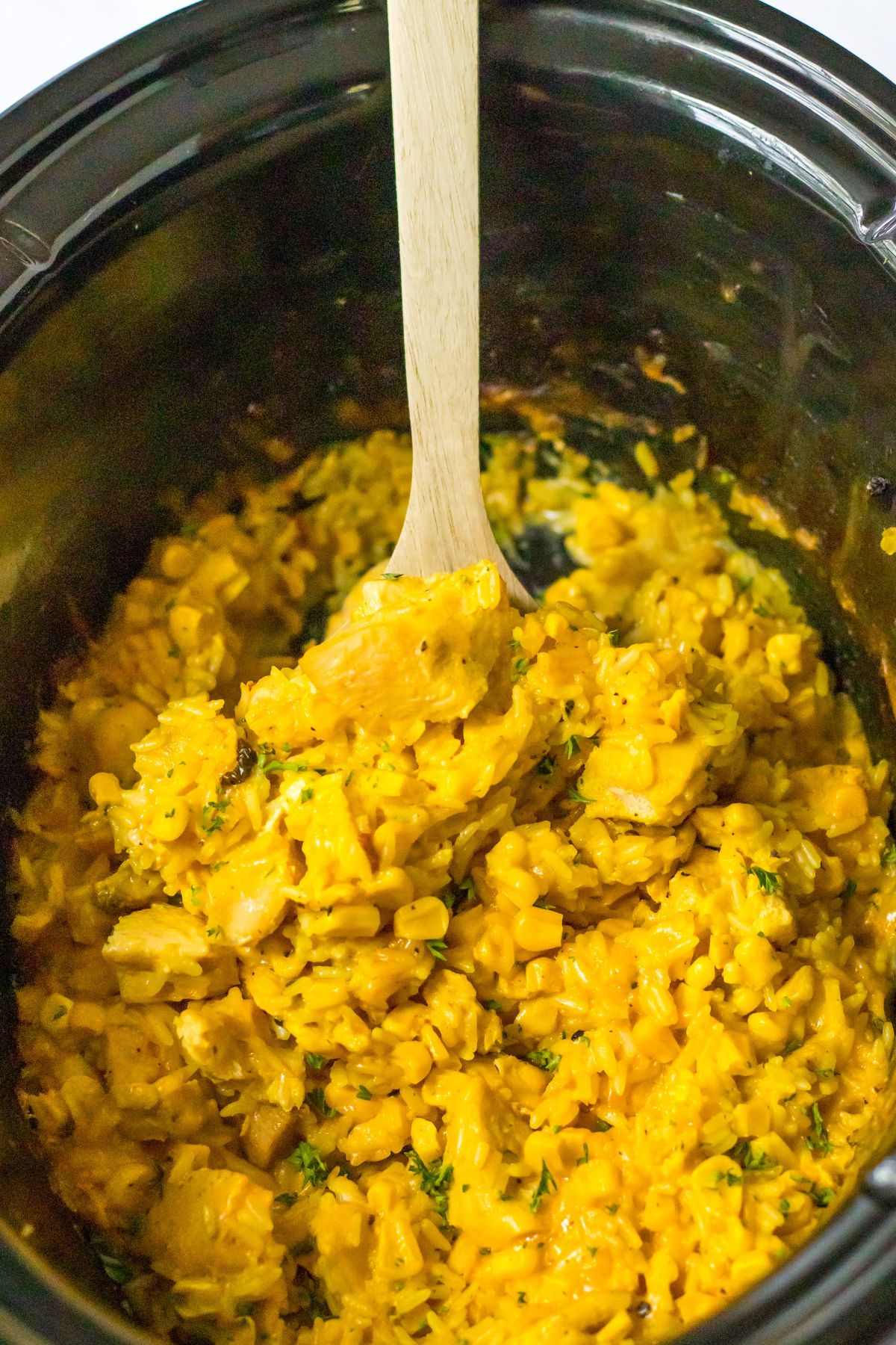 crockpot filled with cheesy chicken.