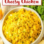 bowl of cheesy chicken and rice on a counter.