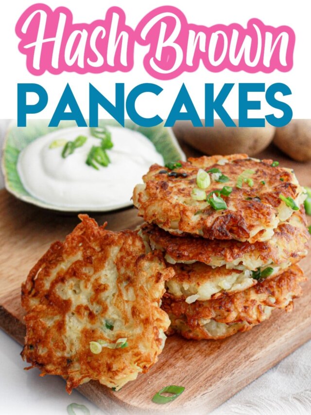 five hash brown pancakes stacked on a wooden cutting board.
