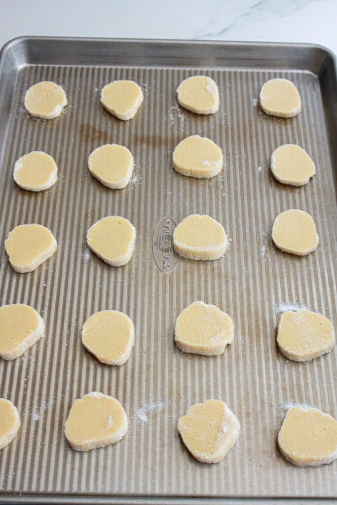 raw cookie dough on a baking sheet.