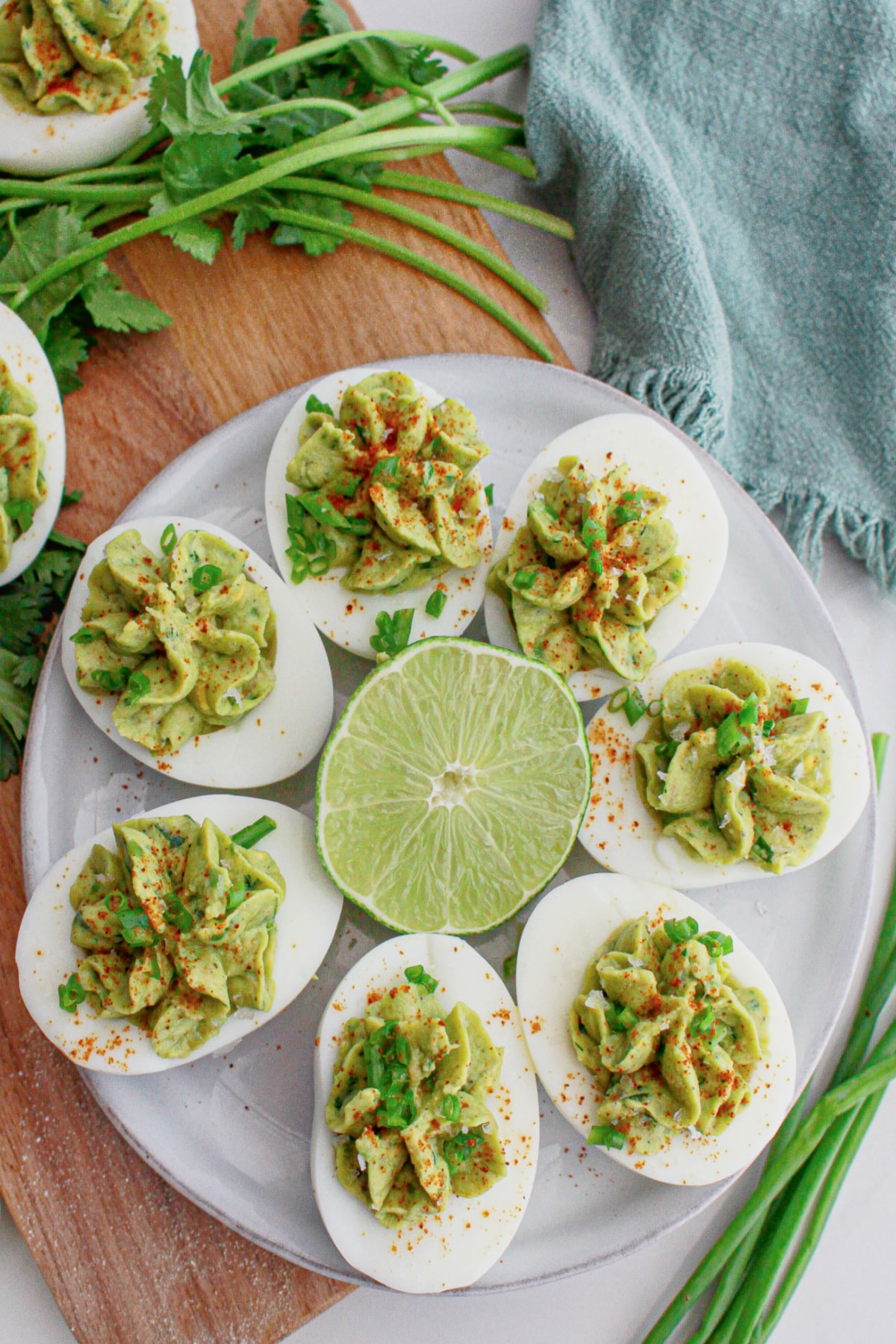 guacamole deviled eggs on a plate.