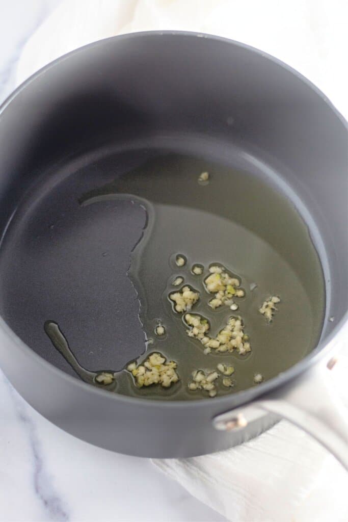 garlic and oil in a saucepan.