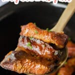 bbq country ribs on a wooden spoon.