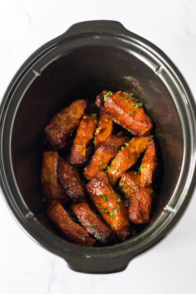 cooked country style ribs in a slow cooker.