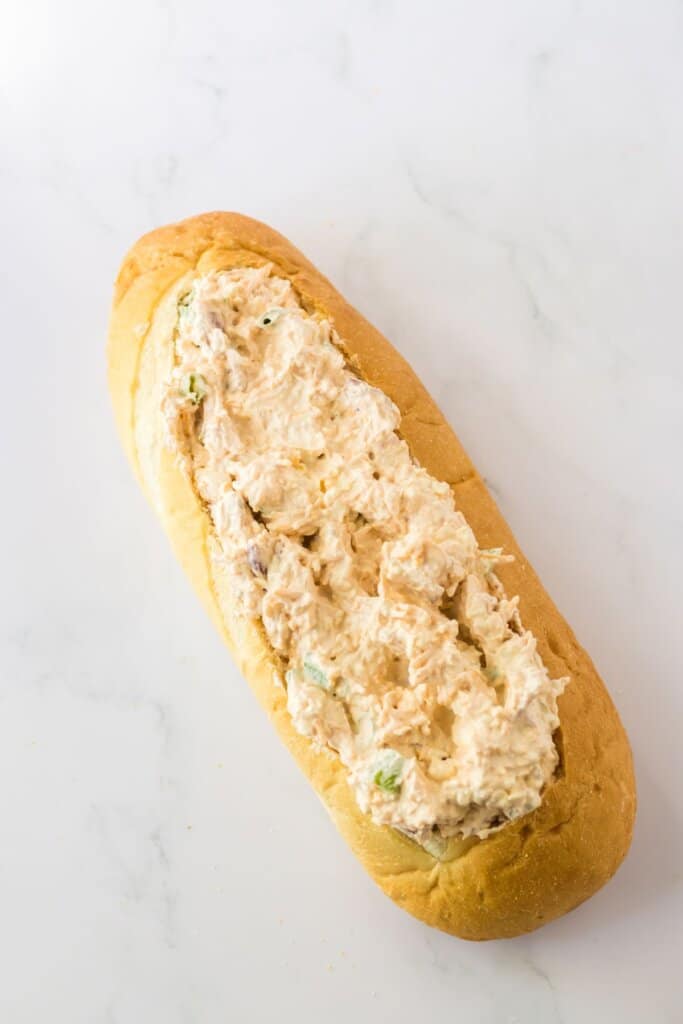 dip stuffed into a loaf of french bread.