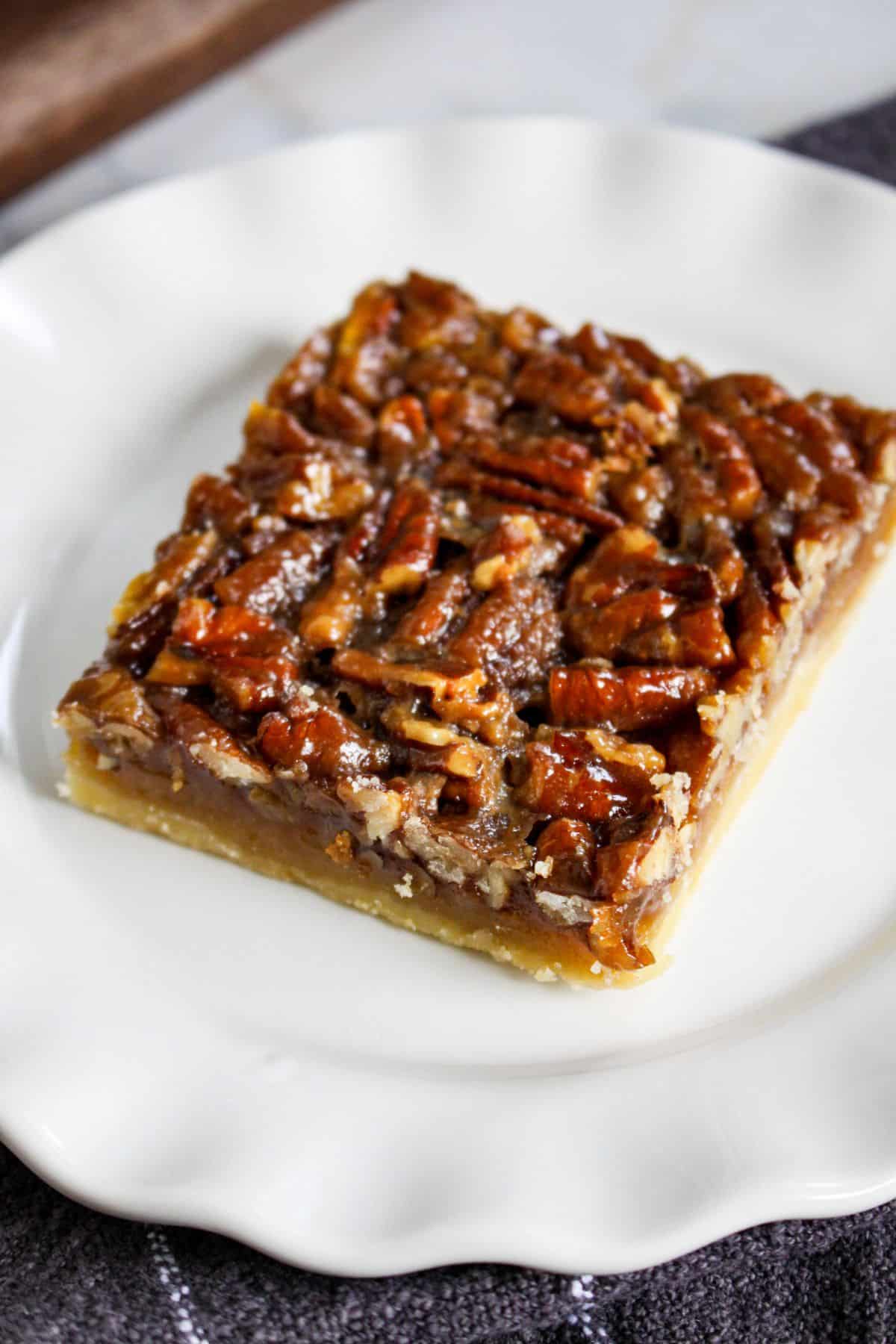 slice of pecan shortbread cookie on a plate.