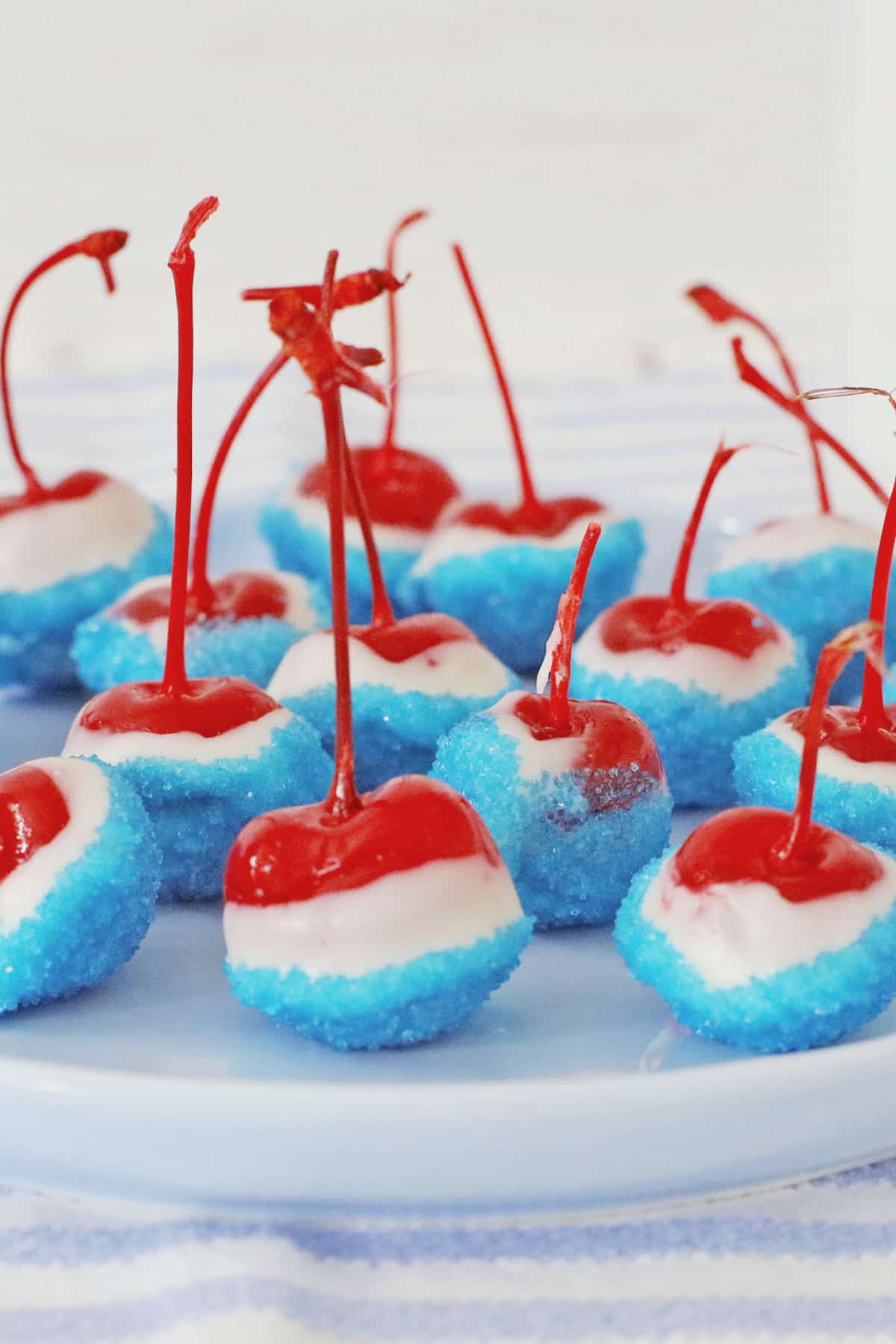 rum soaked cherries on a plate.