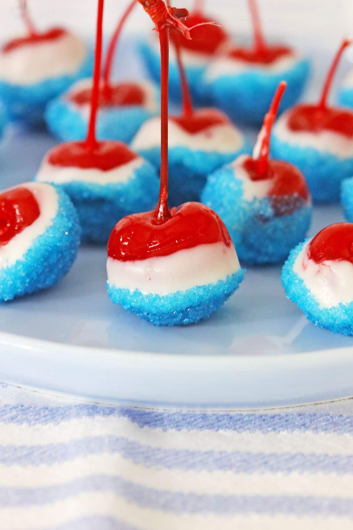 rum soaked cherries on a plate.