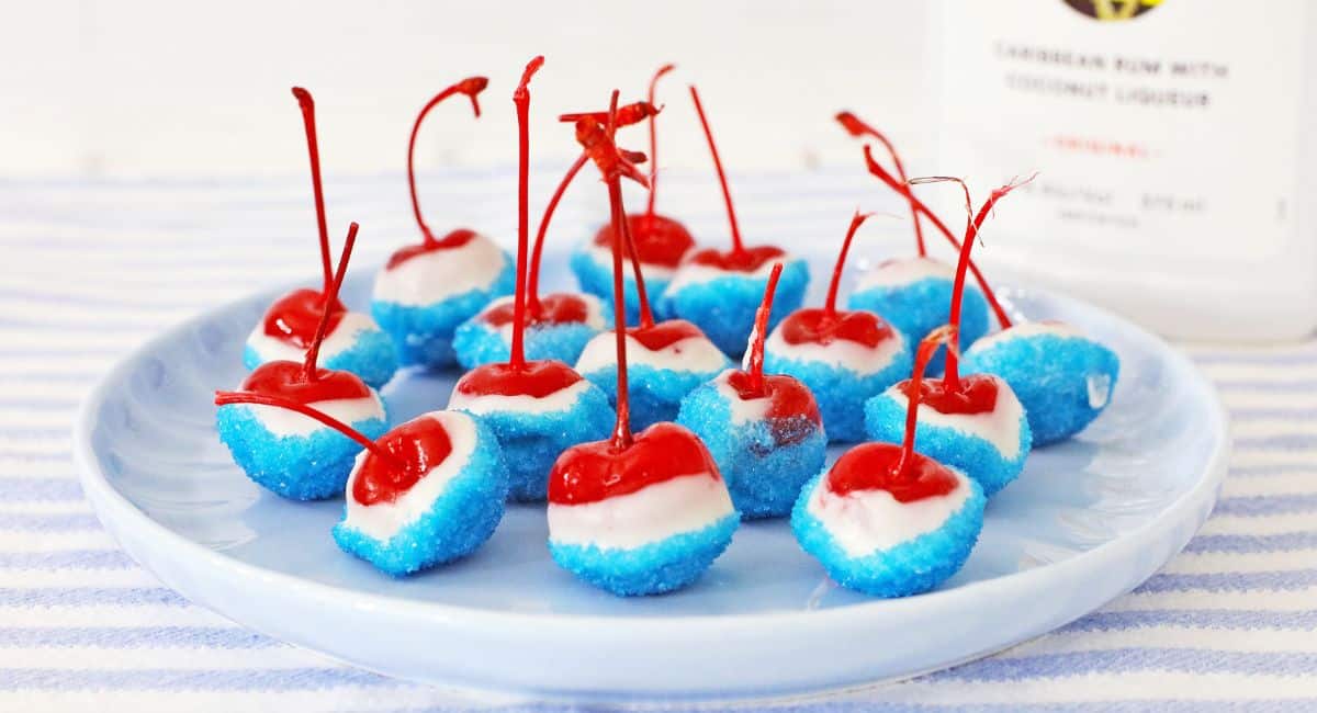 rum soaked cherries on a plate.