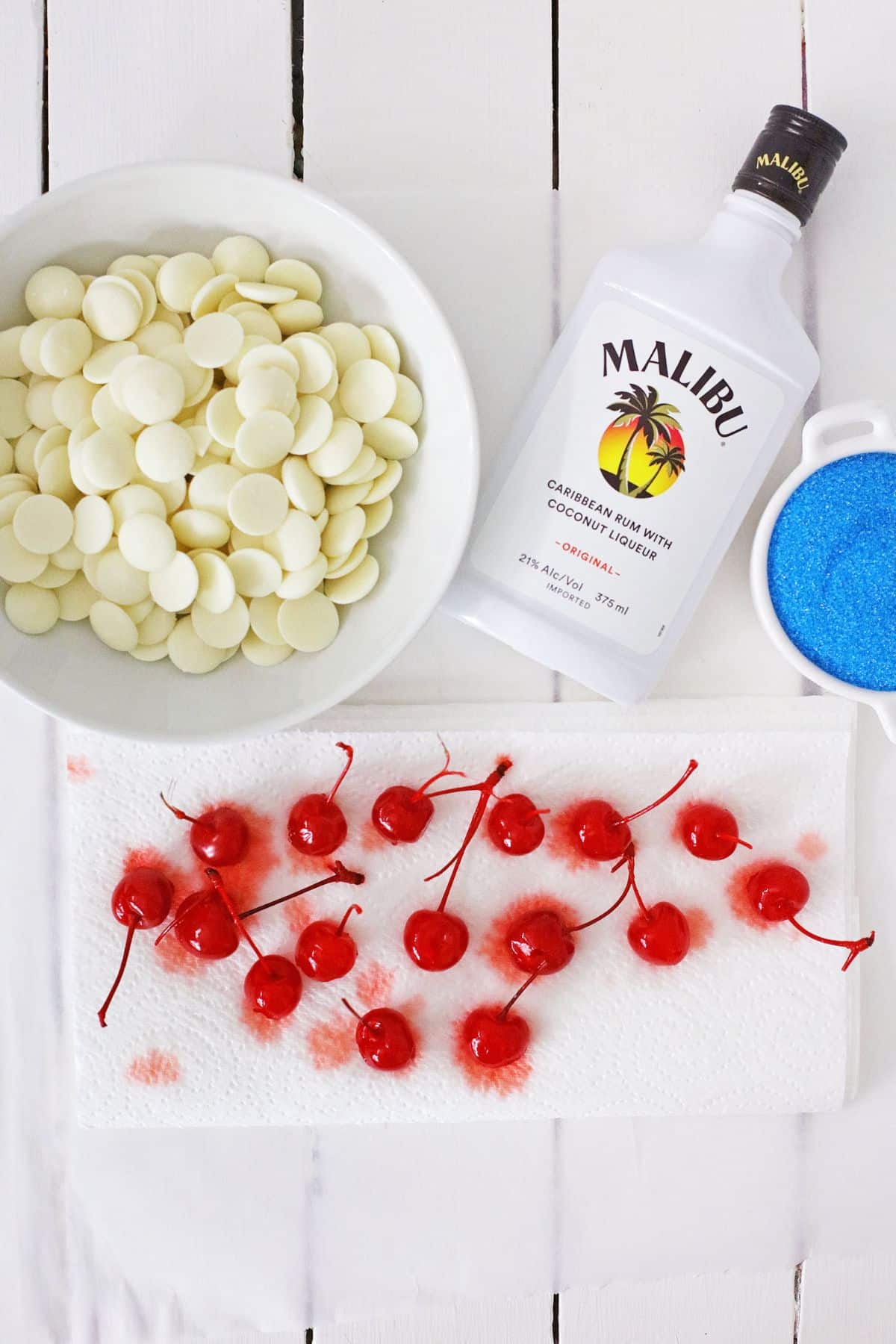 cherries being dried on a paper towel.
