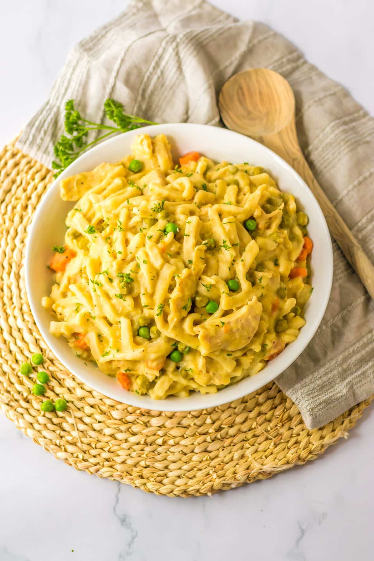 bowl full of slow cooker chicken and noodles.