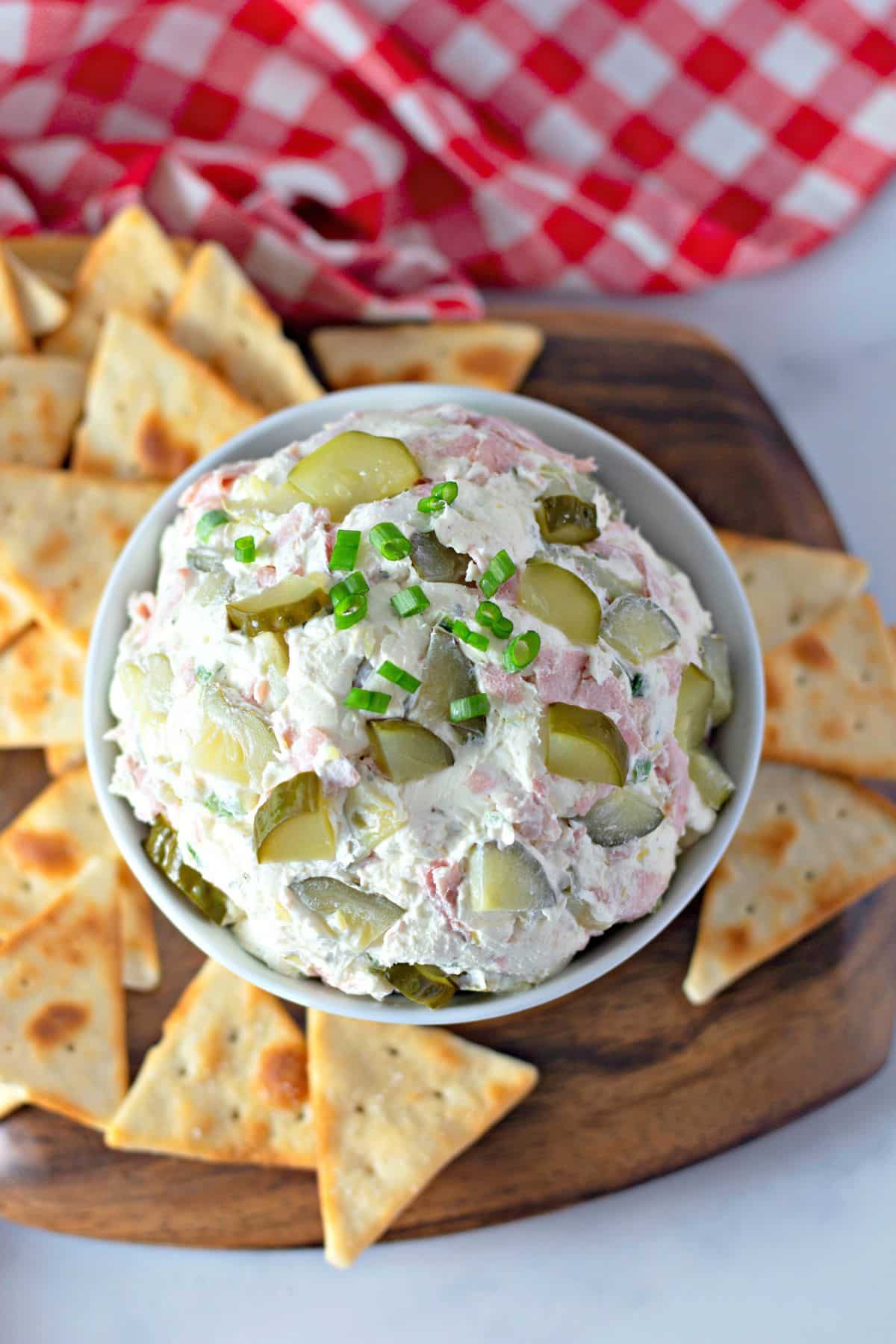 full of dill pickle dip on a counter.