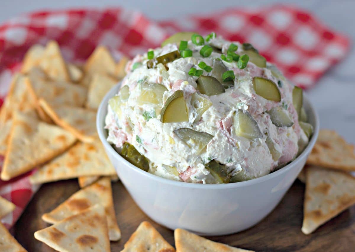 full of dill pickle dip on a counter.