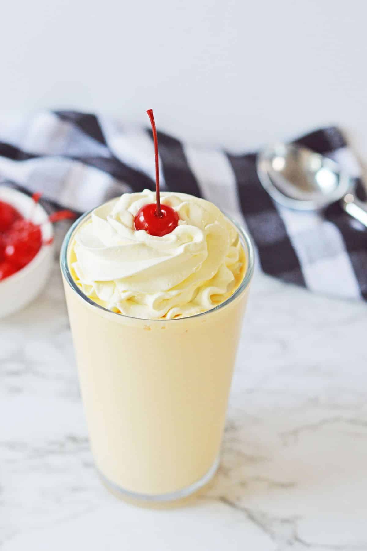 orange creamsicle shake on a counter.