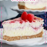 slice of raspberry swirl cheesecake on a plate.