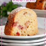 slice of rhubarb strawberry bundt cake on a small plate.