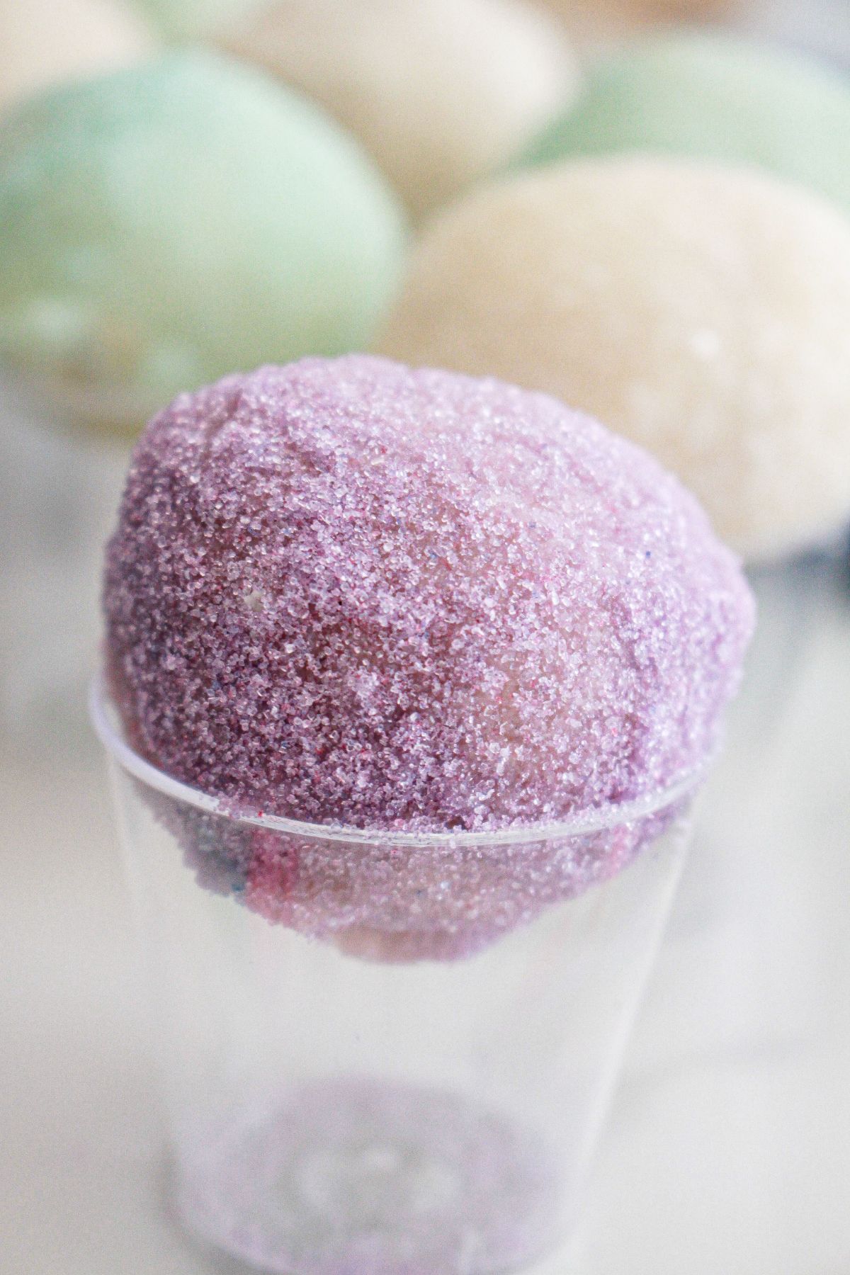 snow cone truffles in small plastic cups.