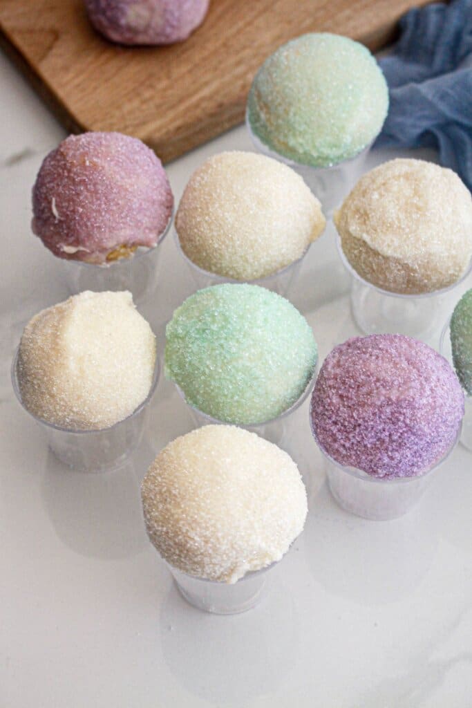 snow cone truffles in small plastic cups.