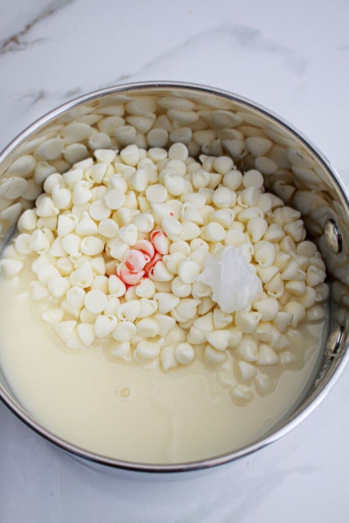 ingreidents being melted in a saucepan over low heat until smooth.