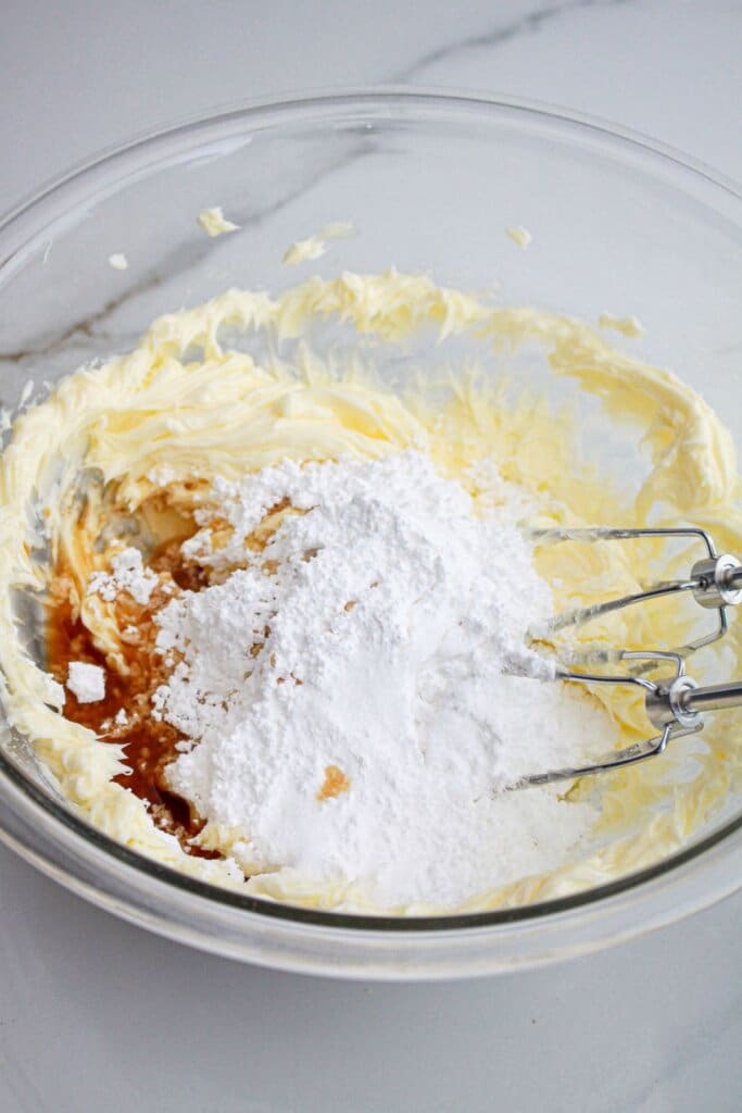 dry ingredients to being added to dough in a glass mixing bowl.