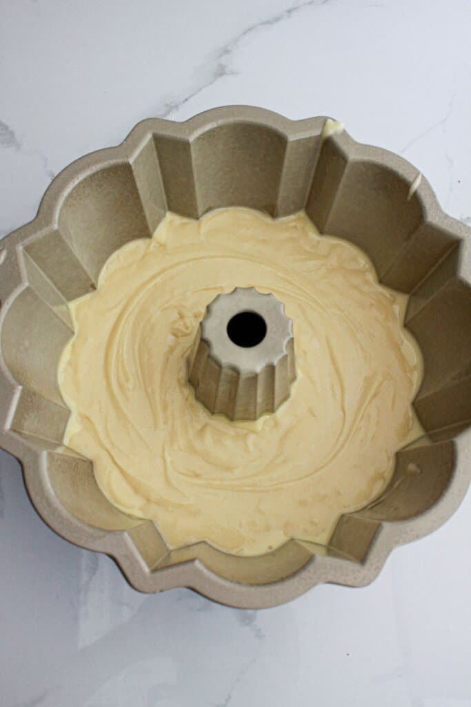 batter in a bundt cake pan.