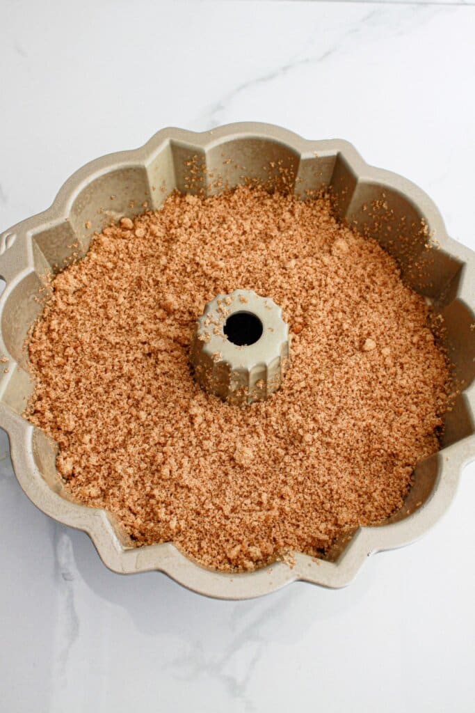 crumble topping in a bundt cake pound.
